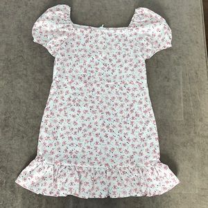 Shein floral print dress with puff sleeves and ruffle trim. Size 9yr